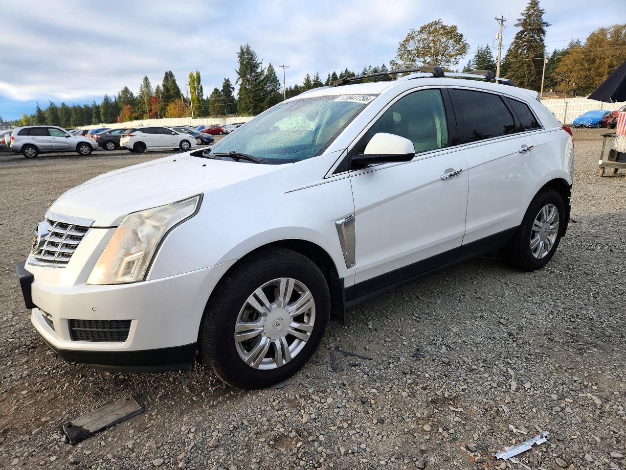 2014 CADILLAC SRX Luxury — Front 3/4