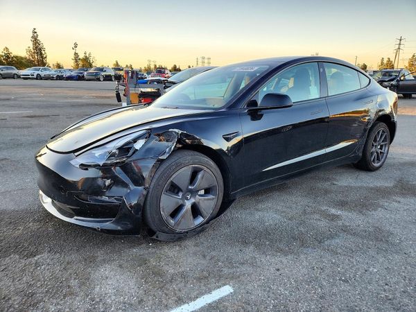 2022 TESLA MODEL 3 — Front 3/4
