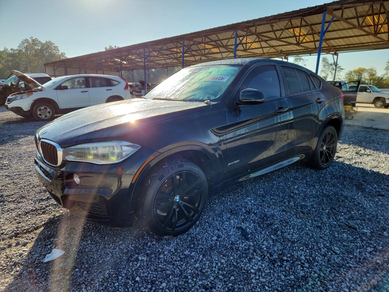 2015 BMW X6 xDrive35i — Front 3/4