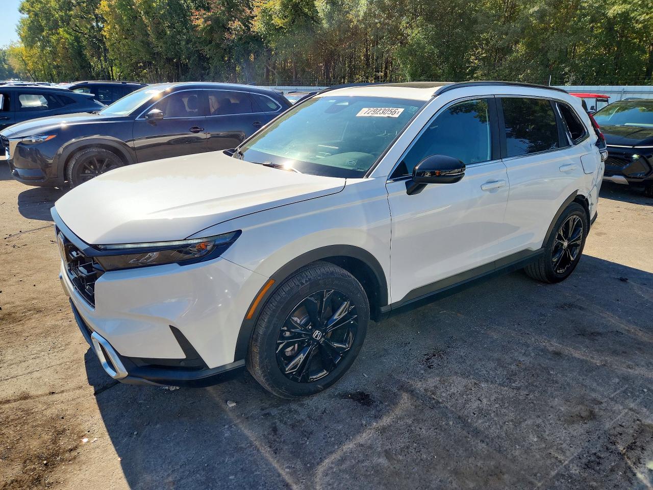 2025 HONDA CR-V Sport Touring — Front 3/4