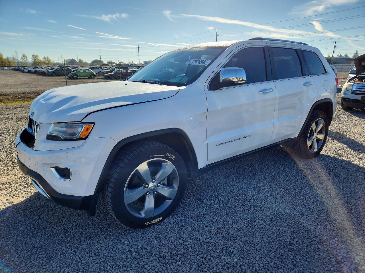 2015 JEEP GRAND CHEROKEE Limited — Front 3/4