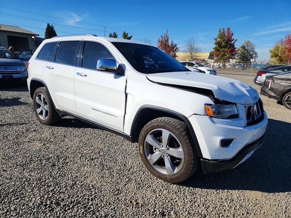 2015 JEEP GRAND CHEROKEE Limited — Passenger 3/4