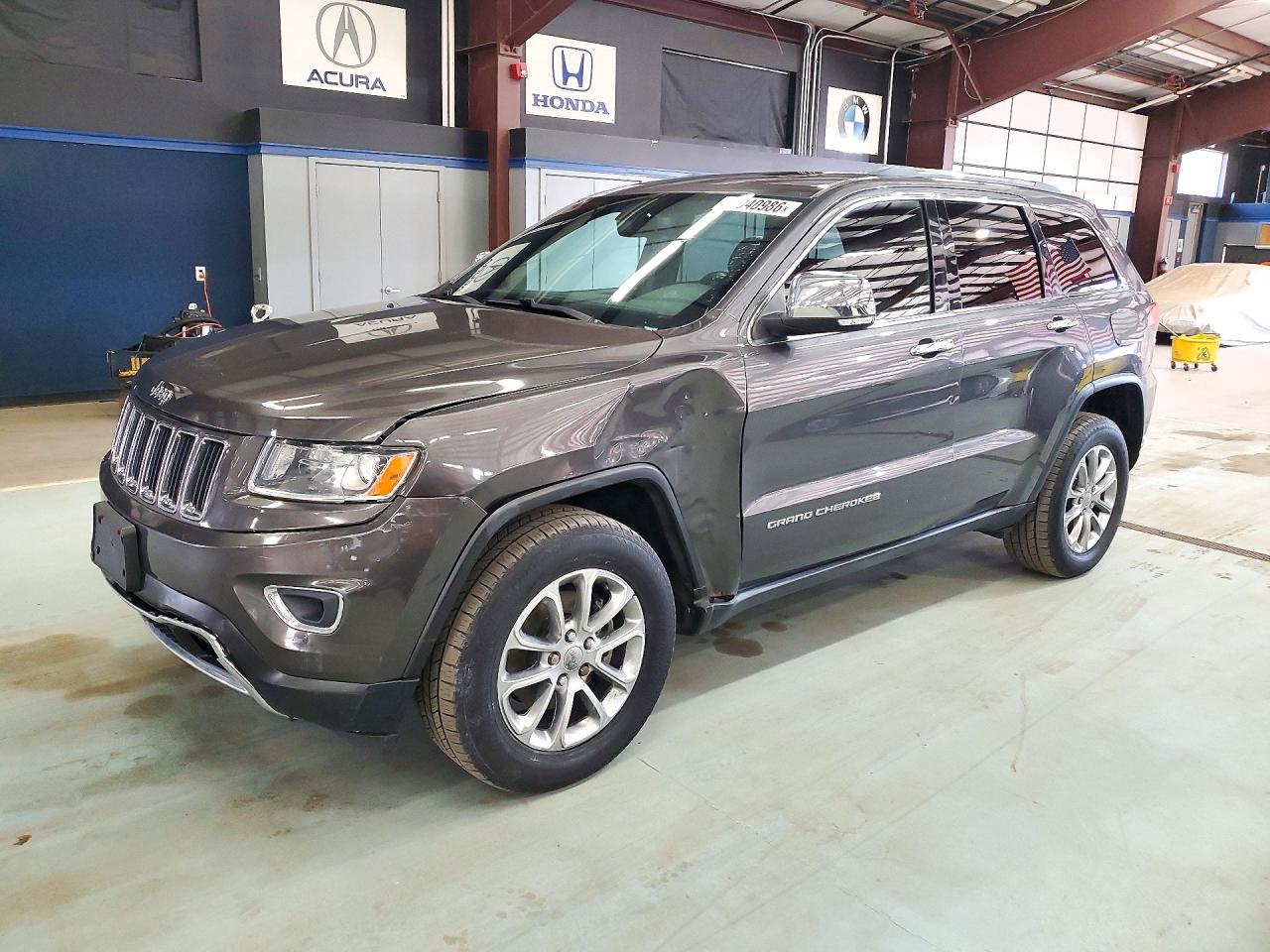 2015 JEEP GRAND CHEROKEE Limited — Front 3/4