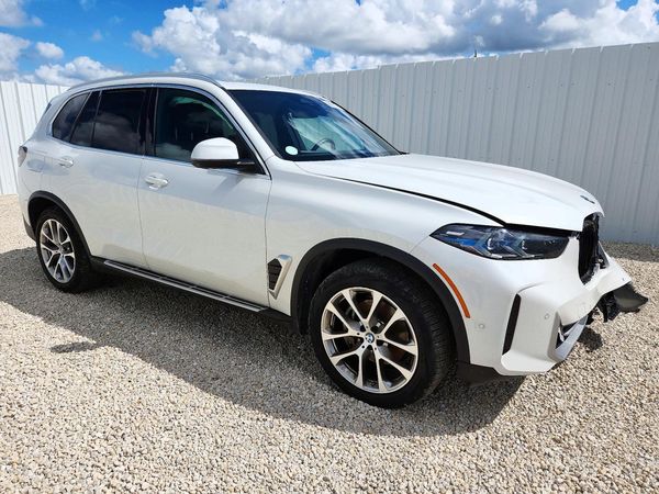 2026 BMW X5 xDrive40 — Passenger 3/4