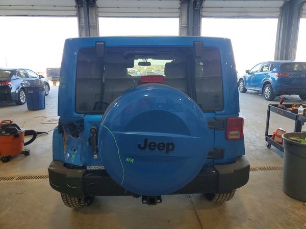 2014 JEEP WRANGLER Sahara — DIRR