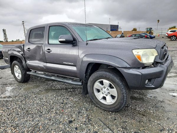 2014 TOYOTA TACOMA Delux Grade — Passenger 3/4