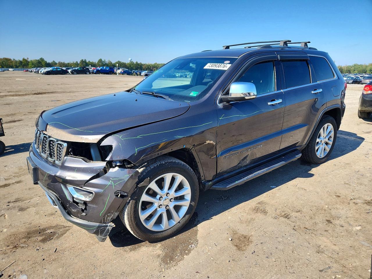 2017 JEEP GRAND CHEROKEE Limited — Front 3/4