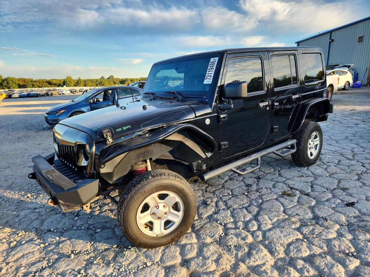 2013 JEEP WRANGLER UNLIMITED SAHARA 4X4 — Front 3/4