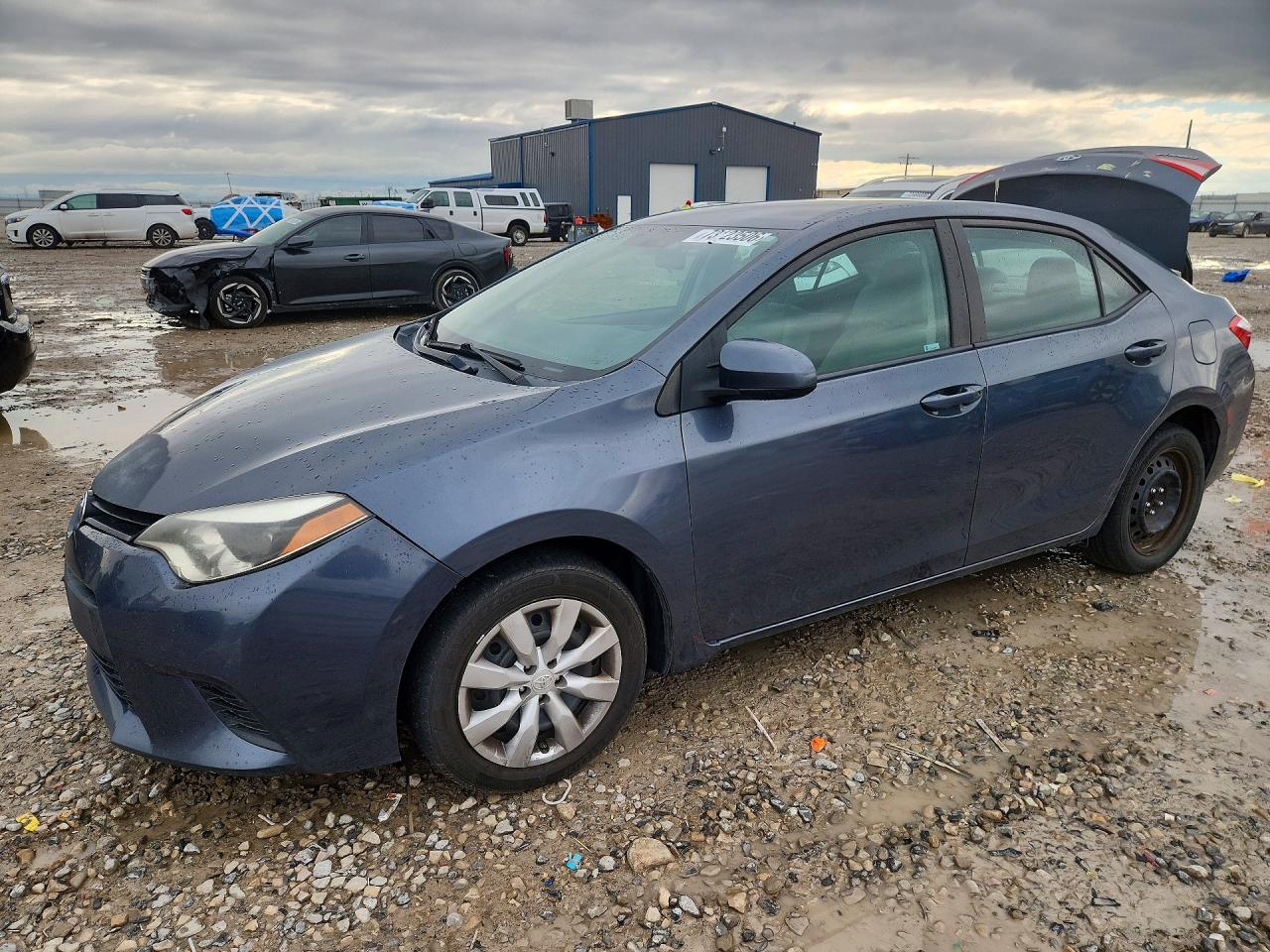 2014 TOYOTA COROLLA L/LE — Front 3/4