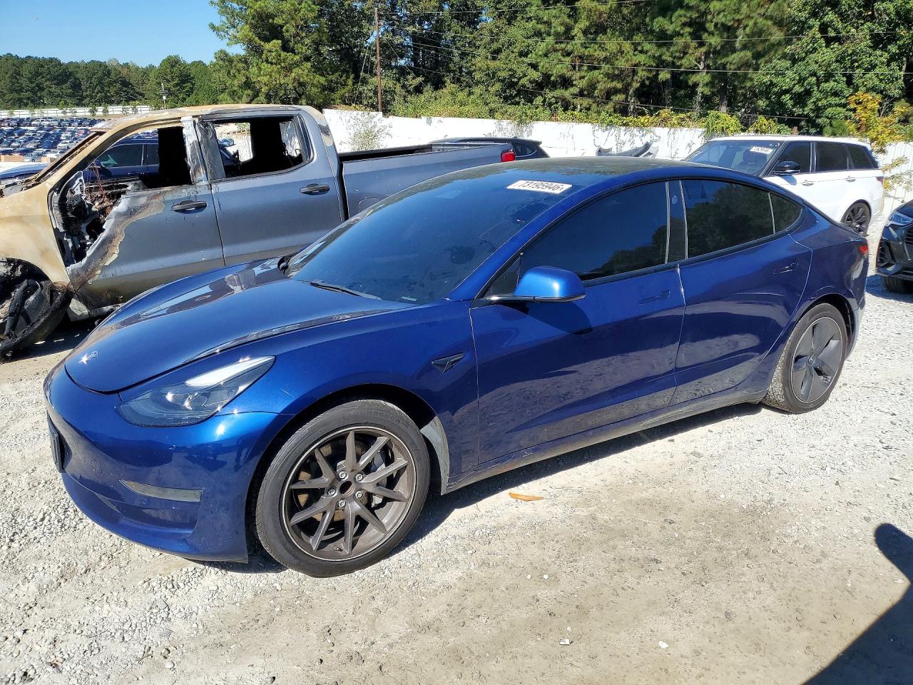 2021 TESLA MODEL 3 — Front 3/4