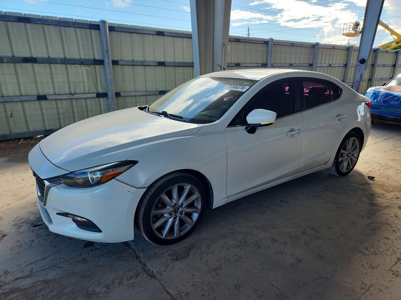 2017 MAZDA 3 Touring — Front 3/4