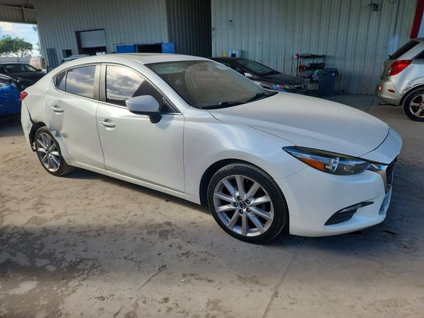 2017 MAZDA 3 Touring — Passenger 3/4