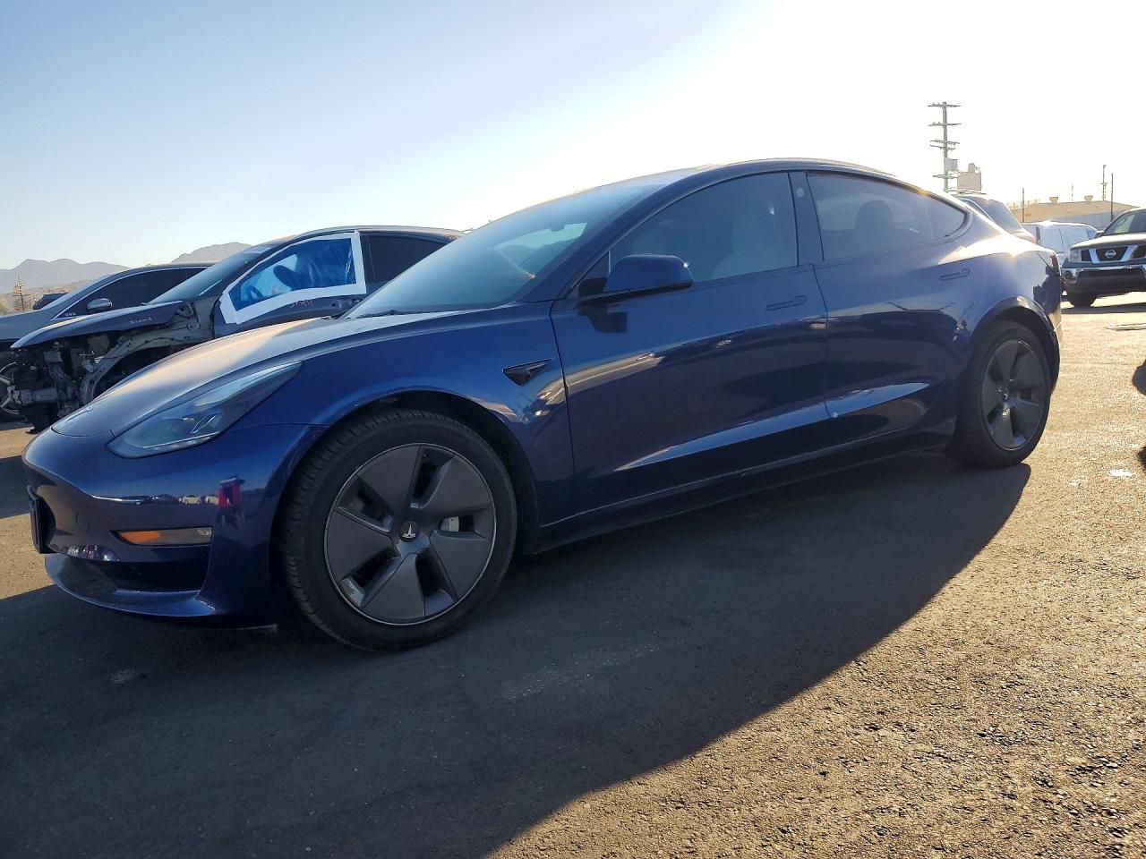 2022 TESLA MODEL 3 — Front 3/4