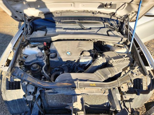 2012 BMW X1 xDrive28i — Engine bay
