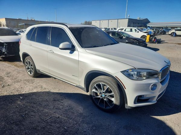 2015 BMW X5 xDrive35d — Passenger 3/4