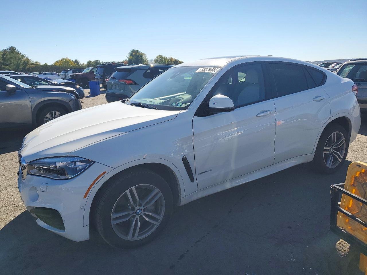 2015 BMW X6 xDrive50i — Front 3/4