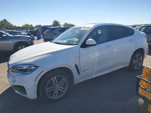 2015 BMW X6 xDrive50i — Front 3/4