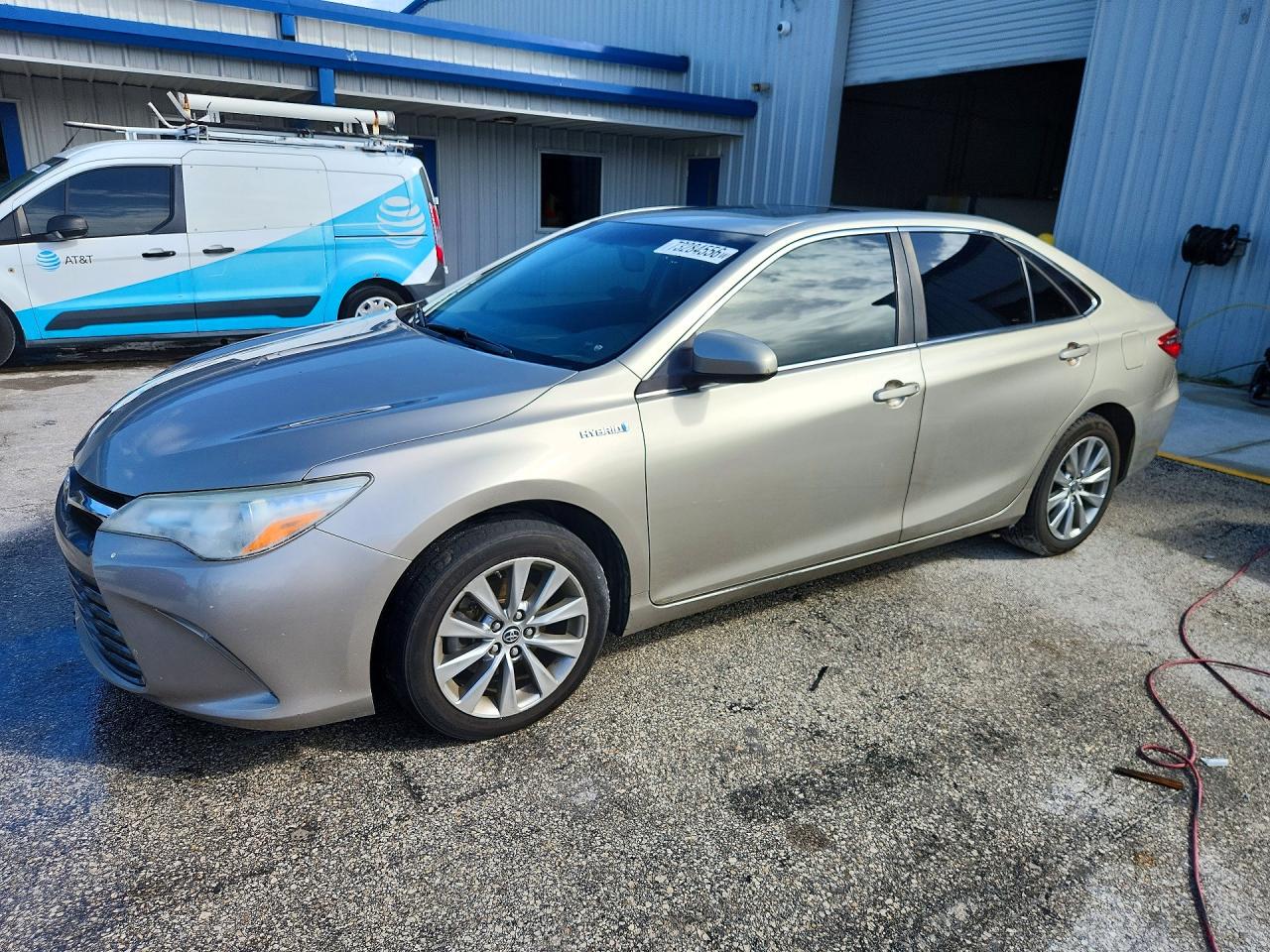 2015 TOYOTA CAMRY SOLA Hybrid — Front 3/4