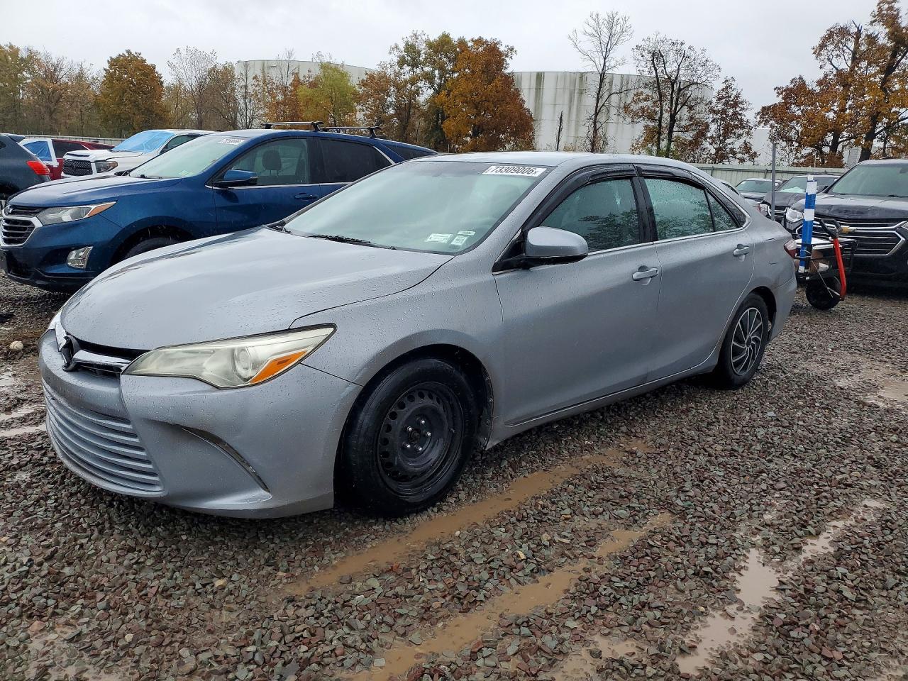 2015 TOYOTA CAMRY SOLA Hybrid — Front 3/4