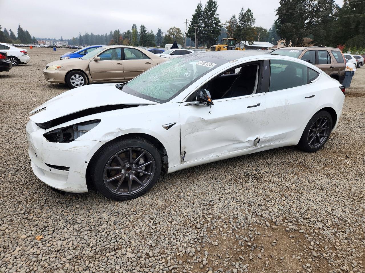 2020 TESLA MODEL 3 — Front 3/4