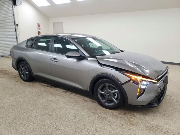 2026 KIA K4 LX, LXS — Passenger 3/4