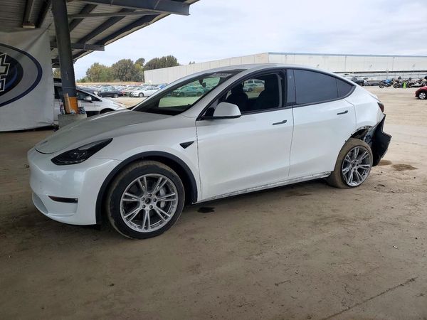 2023 TESLA MODEL Y — Front 3/4