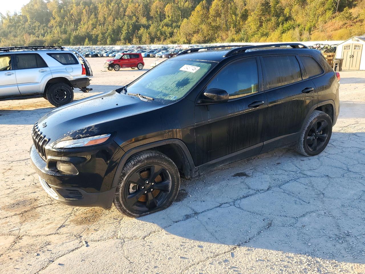 2017 JEEP CHEROKEE Sport — Front 3/4