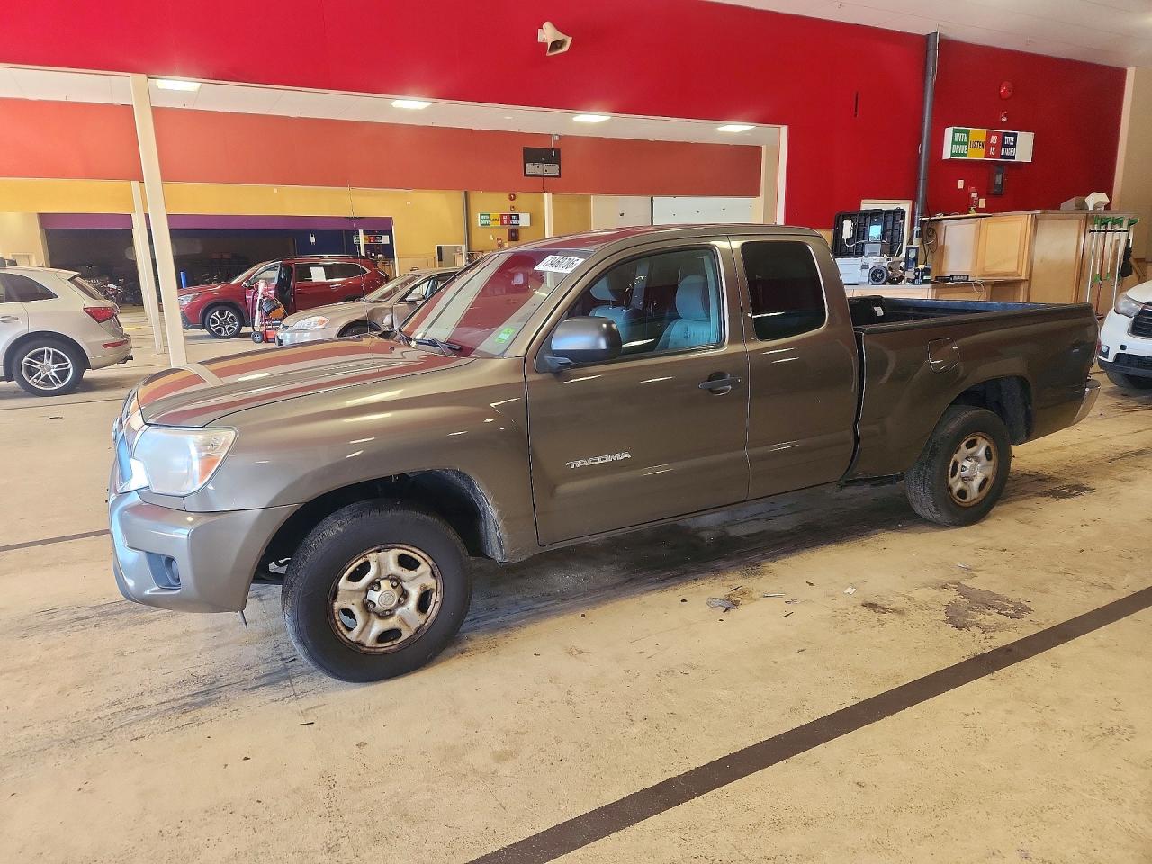 2013 TOYOTA TACOMA Delux — Front 3/4