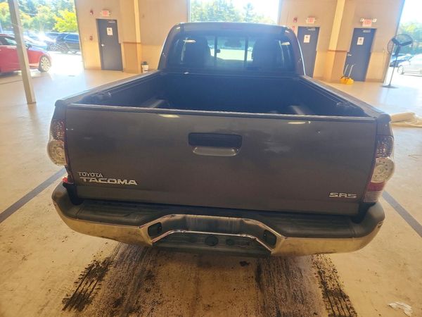 2013 TOYOTA TACOMA Delux — DIRR