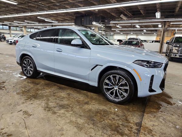 2027 BMW X6 xDrive40i — Passenger 3/4