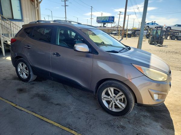 2013 HYUNDAI TUCSON — Passenger 3/4
