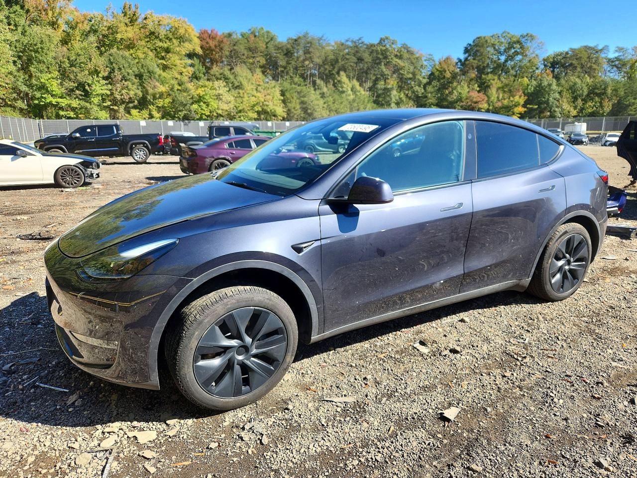 2025 TESLA MODEL Y — Front 3/4