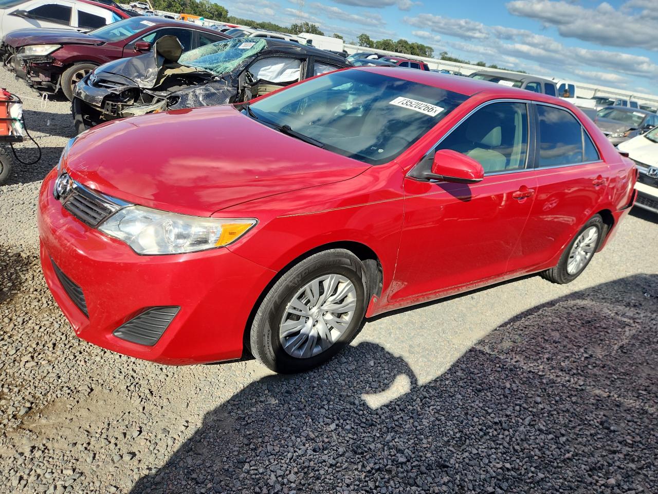 2014 TOYOTA CAMRY — Front 3/4