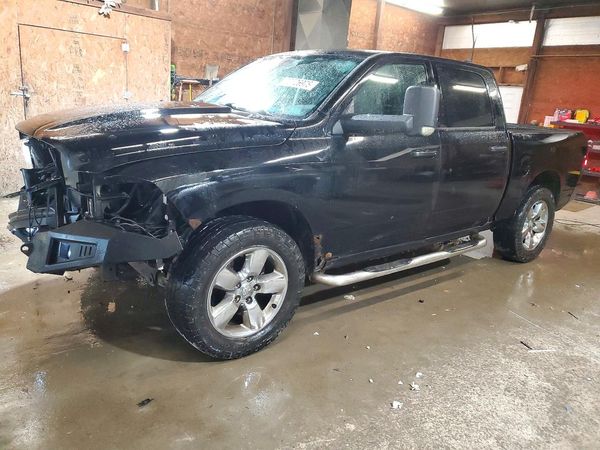 2014 RAM 1500 SLT — Front 3/4