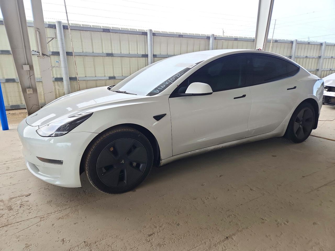 2022 TESLA MODEL 3 — Front 3/4