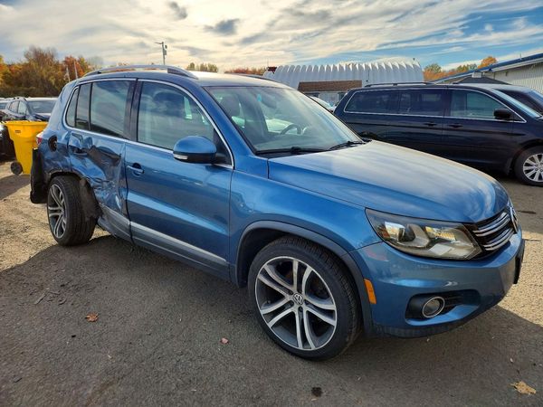2017 VOLKSWAGEN TIGUAN SEL 4Motion — Passenger 3/4