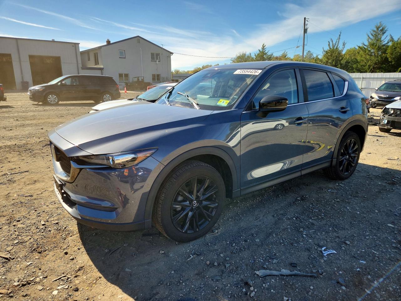 2021 MAZDA CX-5 Touring — Front 3/4