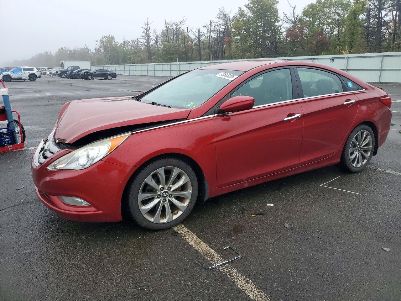 2012 HYUNDAI SONATA Middle level — Front 3/4