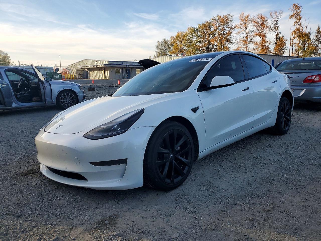 2021 TESLA MODEL 3 — Front 3/4
