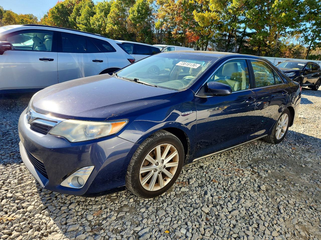 2014 TOYOTA CAMRY SOLA Hybrid — Front 3/4