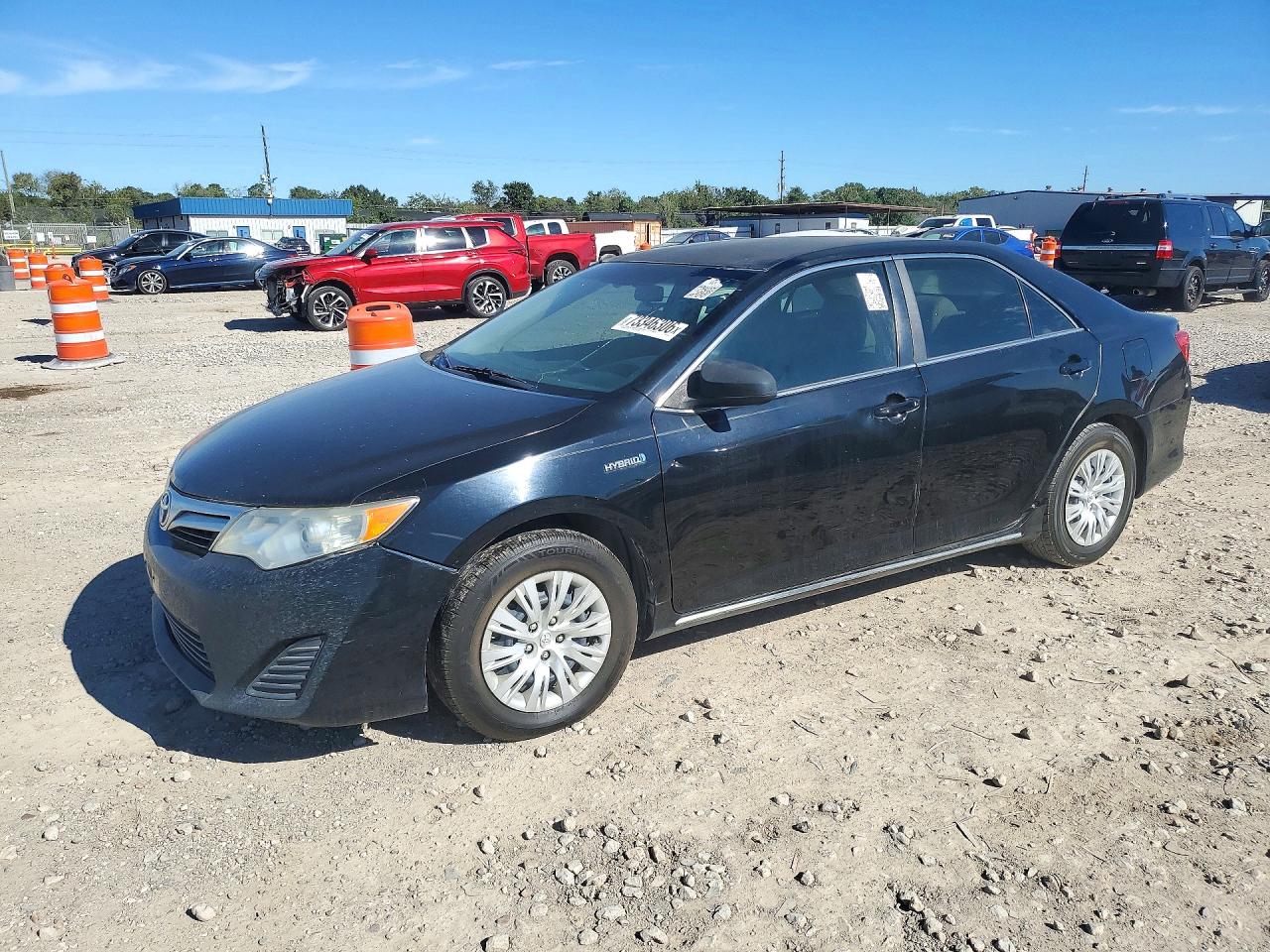 2013 TOYOTA CAMRY SOLA Hybrid — Front 3/4