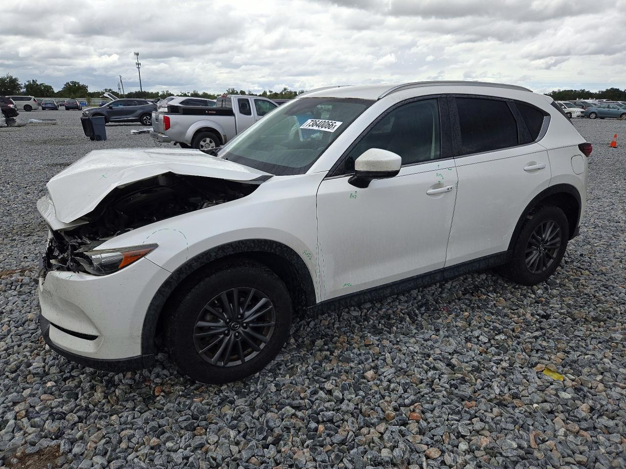 2019 MAZDA CX-5 Touring — Front 3/4