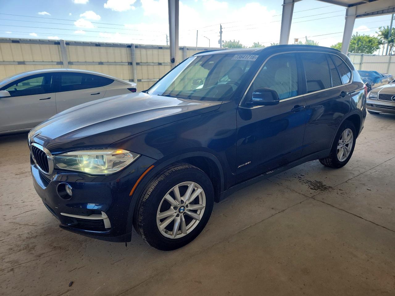 2015 BMW X5 xDrive35i — Front 3/4