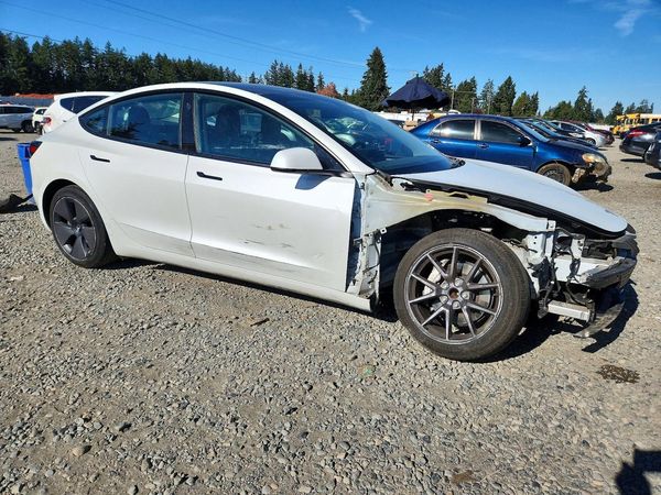 2023 TESLA MODEL 3 — Passenger 3/4