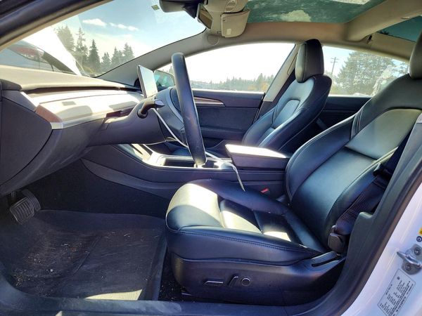 2023 TESLA MODEL 3 — DENT