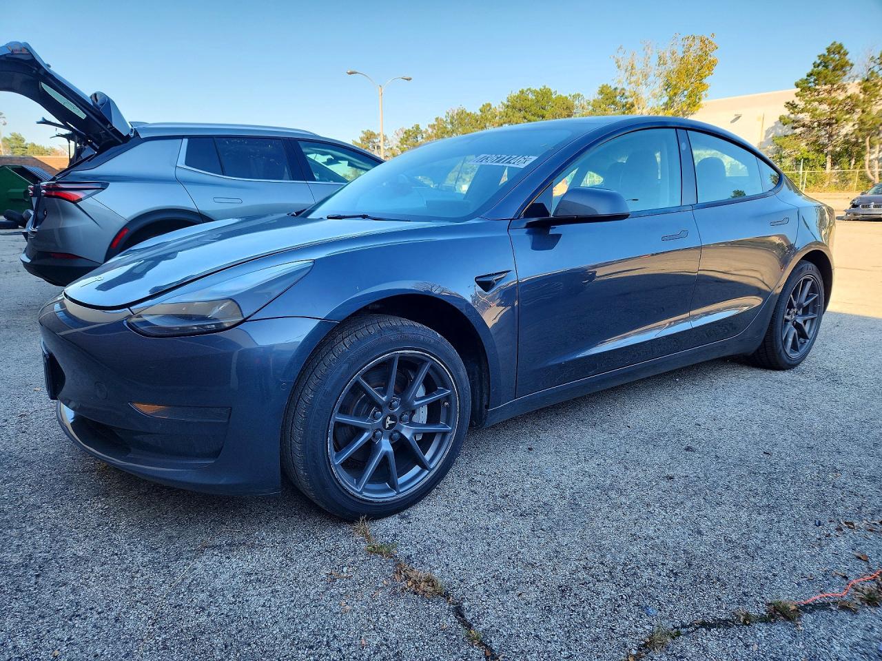 2022 TESLA MODEL 3 — Front 3/4