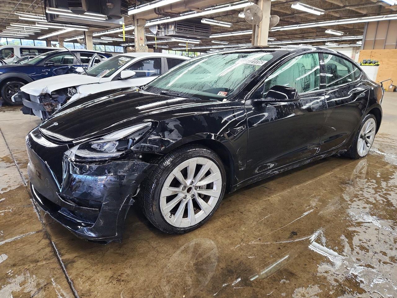 2023 TESLA MODEL 3 — Front 3/4
