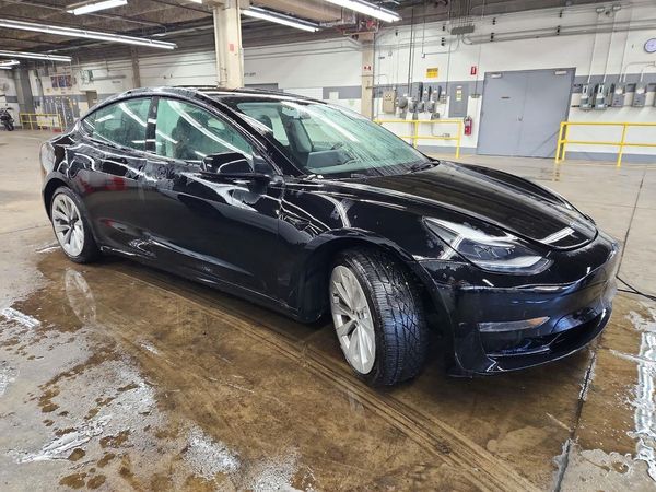 2023 TESLA MODEL 3 — Passenger 3/4