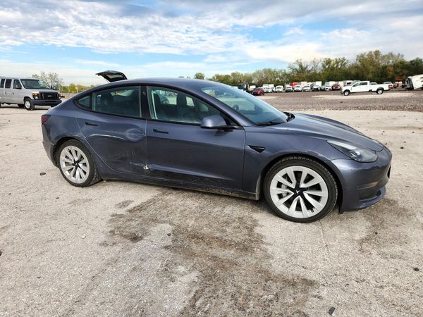 2023 TESLA MODEL 3 — Passenger 3/4