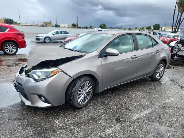 2014 TOYOTA COROLLA L/LE — Front 3/4